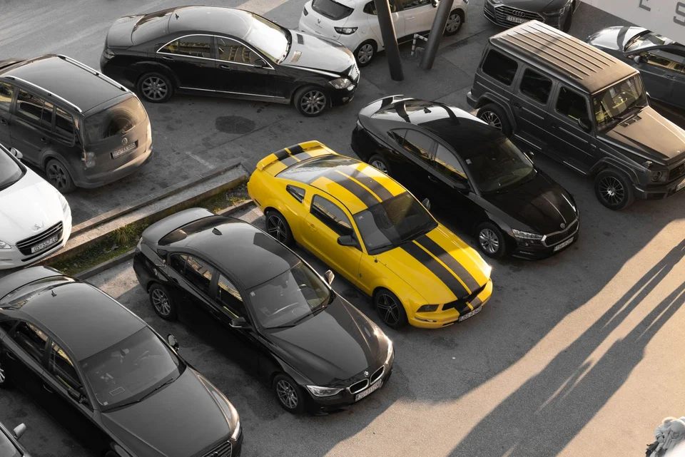 Cars parked in a parking lot.