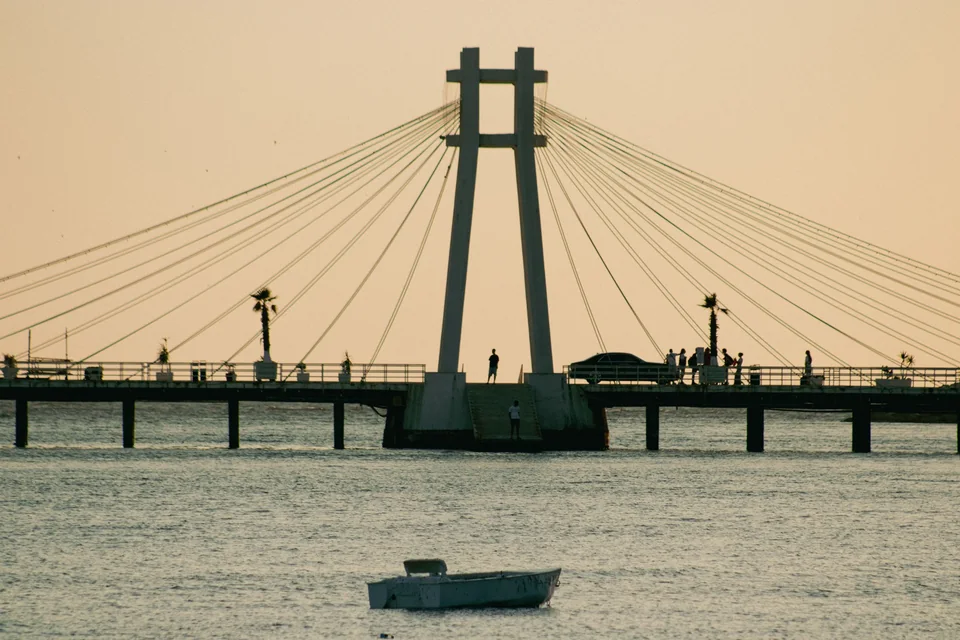 The suspension bridge on the Durrës seafront at sunset