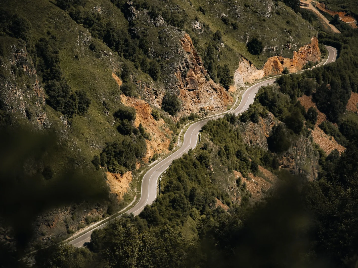 A paved coastal road above Shëngjin