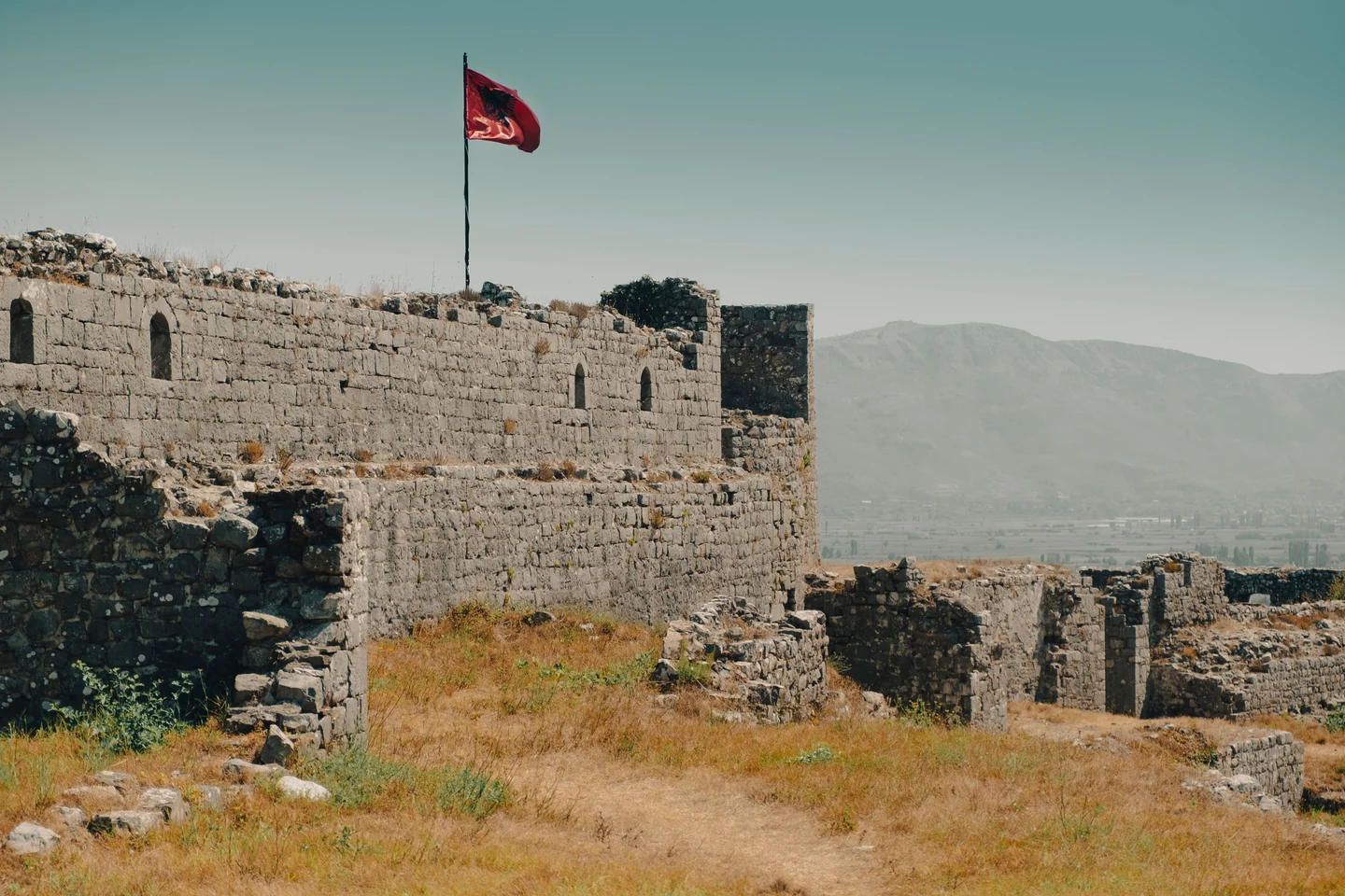 Rozafa Castle walls and the Albanian flag in Shkodër